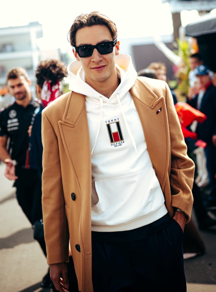 George Russell wears Tommy Hilfiger. 