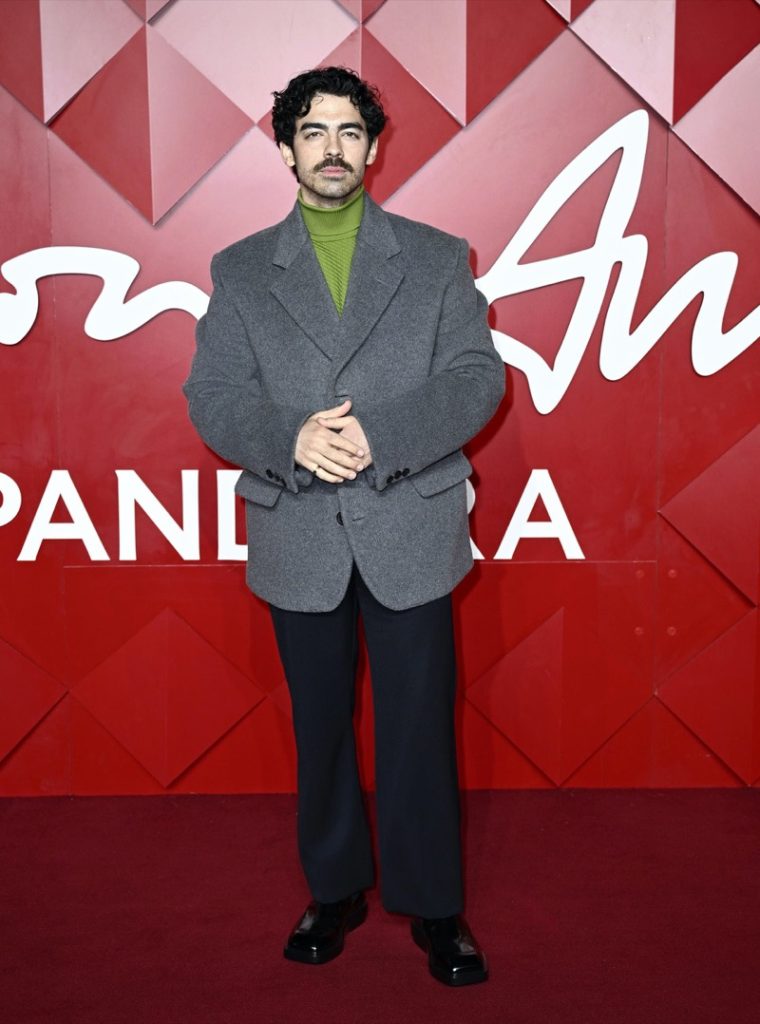 Joe Jonas wears Prada.