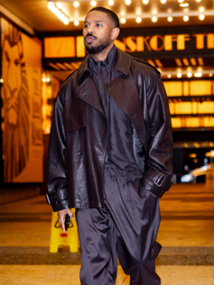 Close-up of Michael B. Jordan in Ferragamo Spring-Summer 2025, featuring dark espresso layers and leather outerwear.