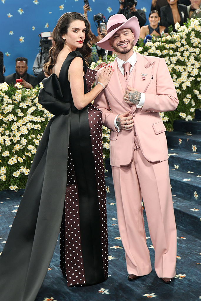 J Balvin in a pink three-piece suit and fedora at the Met Gala.