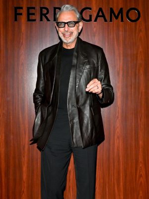 Jeff Goldblum in a black leather blazer, detachable vest, black tee, chino pants, and black Gancini loafers at Ferragamo’s Pre-Met Gala Dinner